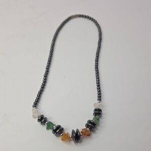 Vintage hematite beaded necklace featuring multi-colored natural stone chips